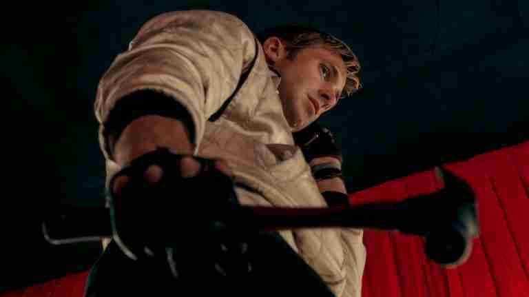 Drive beat sheet featured image hammer scene: Ryan Gosling as Driver wields a hammer over Cook in the strip club dressing room, forcing him to reveal Nino's involvement