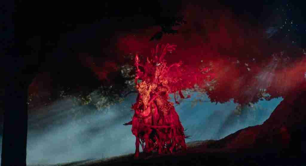 Red Knight hallucination from The Fisher King (1991) – fiery armored rider on horseback representing Parry’s trauma and guilt in the Fisher King beat sheet analysis.