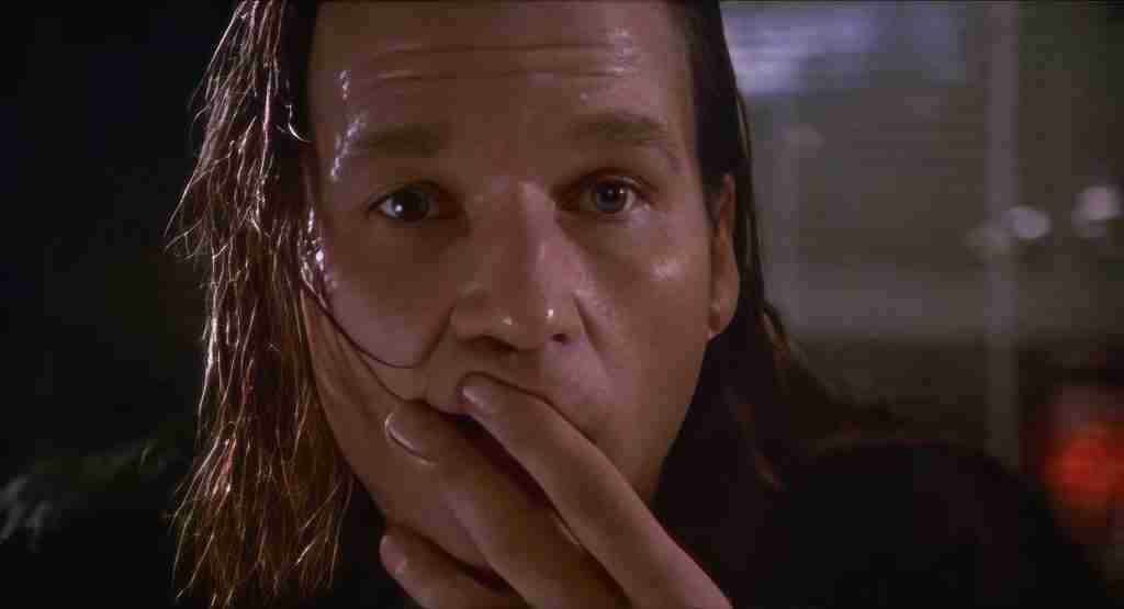 Jeff Bridges as Jack Lucas in The Fisher King (1991), hand over mouth in horror while learning of the mass shooting he incited on his radio show – key opening scene from the Fisher King beat sheet.