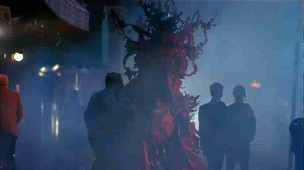 Red Knight hallucination chasing Parry (Robin Williams) after his date with Lydia in The Fisher King (1991) – fiery spectral rider embodying trauma and guilt in the Fisher King beat sheet analysis.