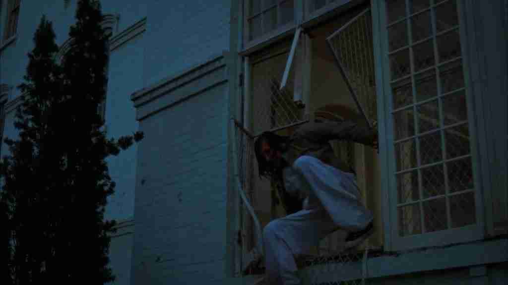 Chief Bromden (Will Sampson) escapes the mental ward by smashing through the window with the hydrotherapy console in One Flew Over the Cuckoo's Nest (1975), symbolizing triumphant freedom and the enduring human spirit