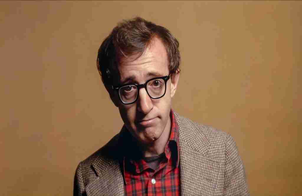 Annie Hall Woody Allen Alvy Singer close-up anxious expression opening monologue Groucho Marx club joke fourth wall break 1977