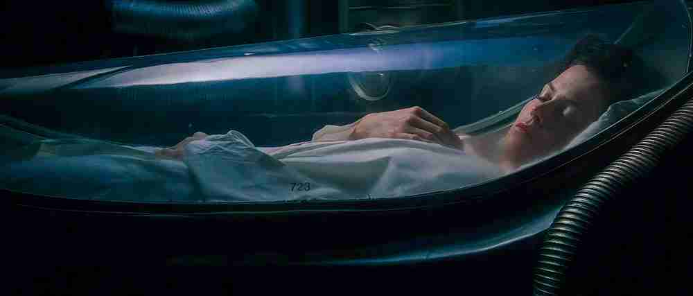 Ripley resting in hypersleep in the Narcissus shuttle, illustrating the Final Image (Beat 15) of the ALIEN Beat Sheet.