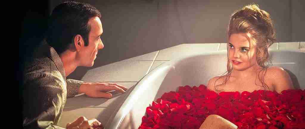 Lester kneels beside Angela in a bathtub of roses in his fantasy, preceding his final choice during the Dark Night of the Soul in the American Beauty Beat Sheet.