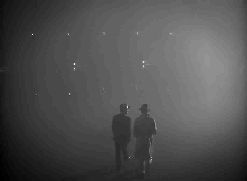 Rick Blaine and Captain Louis Renault walking into the fog, the final shot for the Casablanca beat sheet analysis.