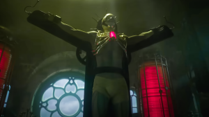 The Frankenstein 2025 analysis featured image shows the Creature on a cross-like apparatus in the gothic laboratory.
