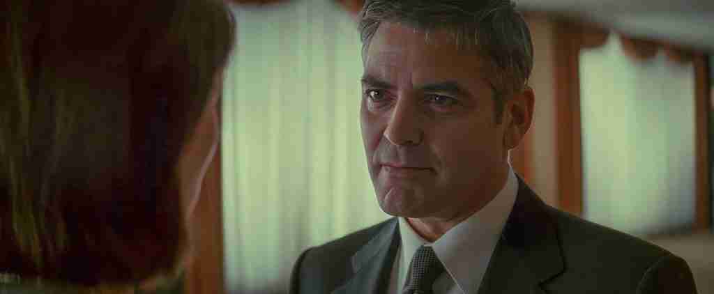 Michael Clayton confronting antagonist Karen Crowder in the final climax scene with the hidden wire.