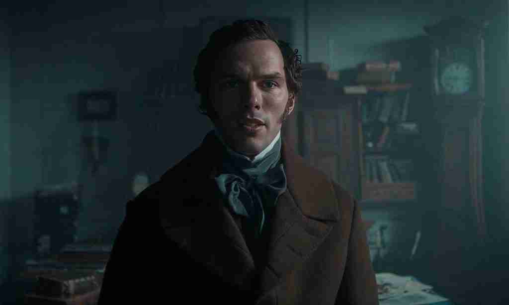 Close-up of Thomas Hutter (Nicholas Hoult) in a dark interior, representing his ambition and the Catalyst for the plot.