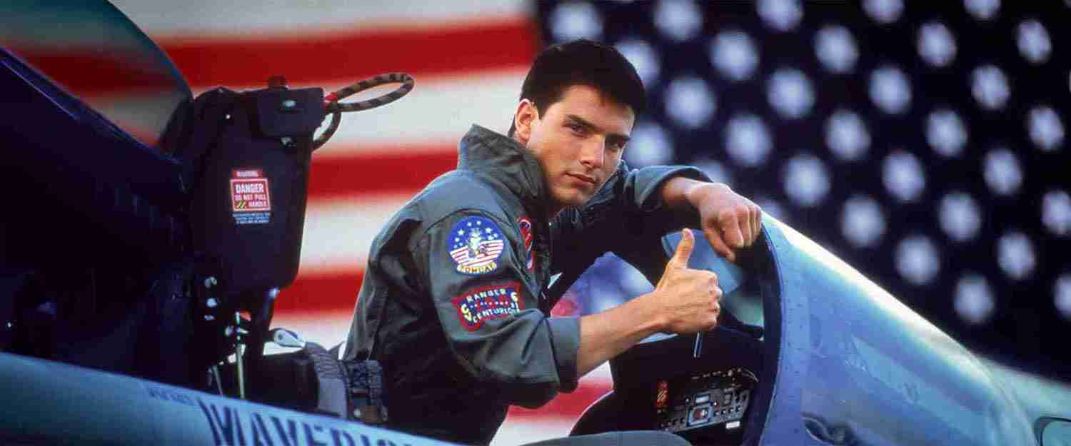 Top Gun 1986 promotional image Maverick in F-14 Tomcat cockpit American flag