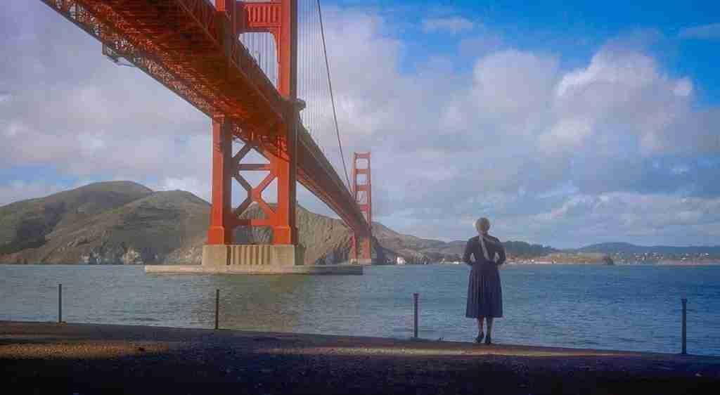 Vertigo Beat Sheet: Madeleine Elster standing by the Golden Gate Bridge just before Scottie's rescue, marking the First Trial.