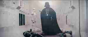 Darth Vader villain introduction in Star Wars A New Hope standing in a white hallway with stormtroopers.
