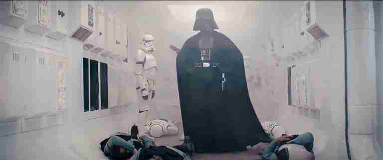 Darth Vader villain introduction in Star Wars A New Hope standing in a white hallway with stormtroopers.