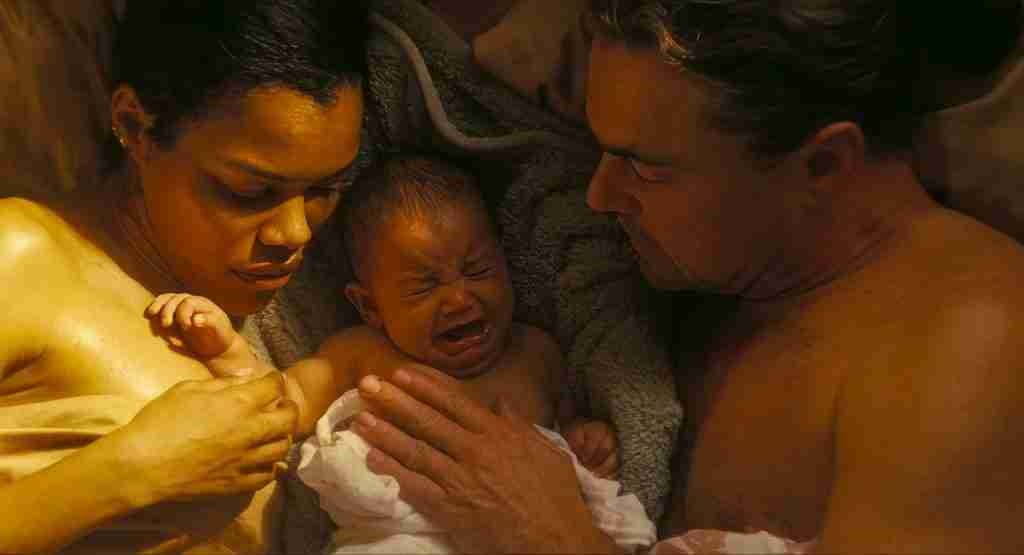 Leonardo DiCaprio and Teyana Taylor as Pat and Perfidia with baby Charlene in a One Battle After Another analysis of generational legacy.