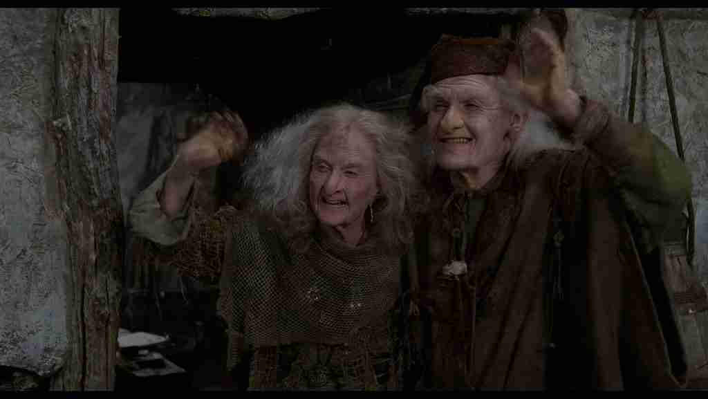 Miracle Max and Valerie waving enthusiastically "Have fun storming the castle" in The Princess Bride