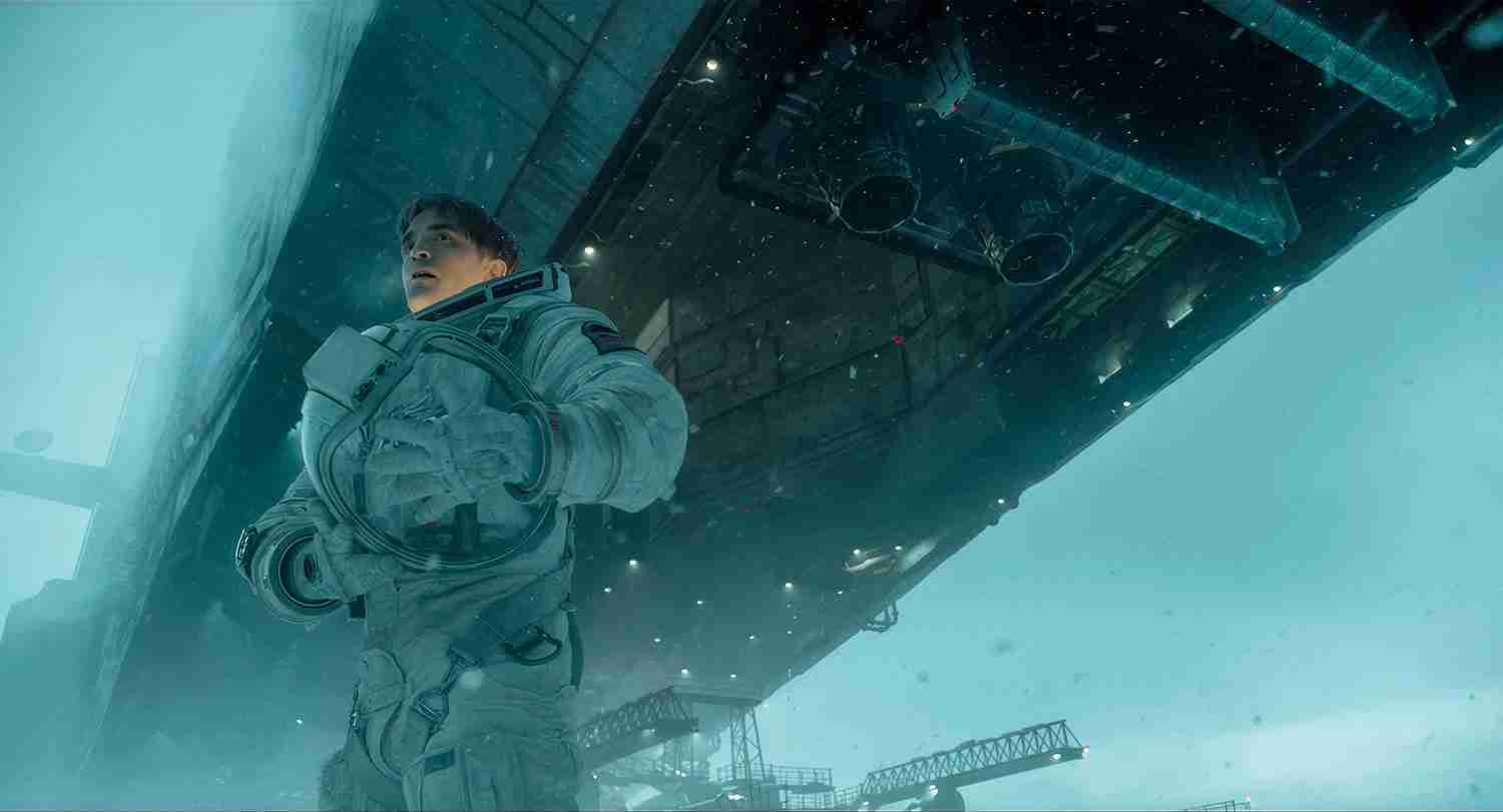 Mickey 17 analysis featured image: Robert Pattinson as Mickey Barnes exposed to deadly virus in Niflheim air for vaccine development, spacesuit open, sci-fi exploitation and sacrifice theme