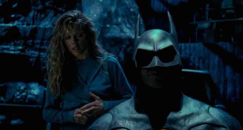 Batman gives Vicki Vale the Smylex research in the Batcave after rescuing her from the museum in Batman (1989).