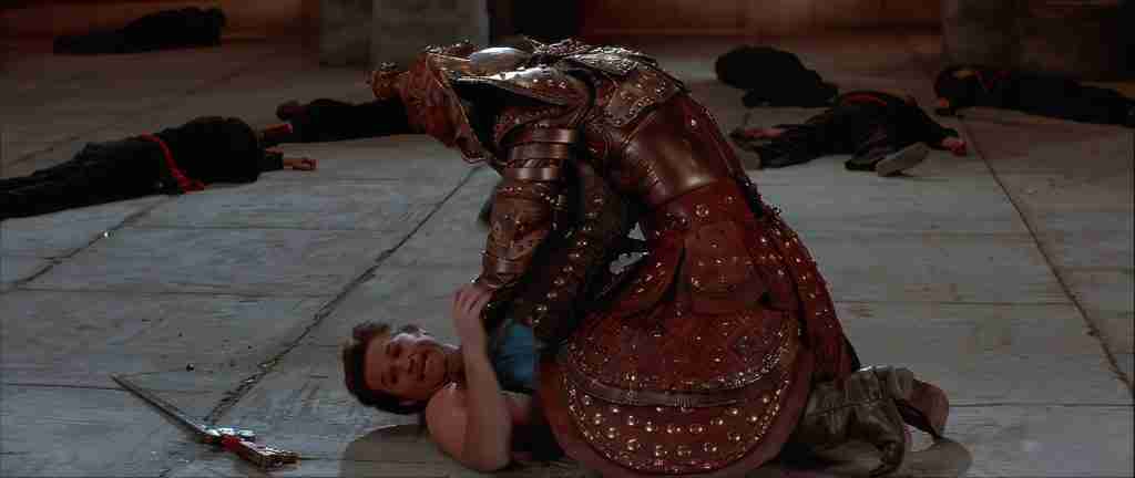 Jack Burton pinned under Chinese Guard Monster after boot knife kill in Big Trouble in Little China analysis