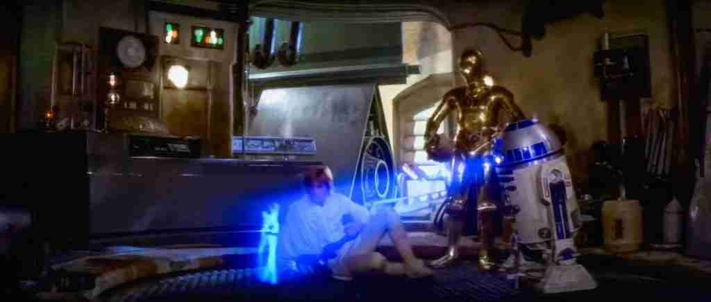 Star Wars 1977 screenplay analysis: Luke Skywalker discovers Princess Leia's hologram message "Help me Obi-Wan Kenobi" projected by R2-D2 in A New Hope