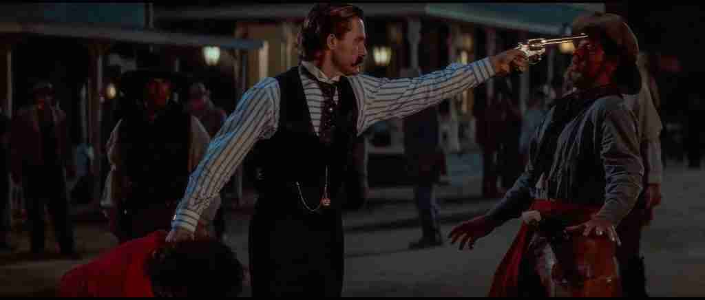 Tombstone analysis: Wyatt Earp holds Ike Clanton at gunpoint after Curly Bill kills Marshal White – demanding justice over lawless escape