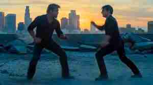 AI-generated video of Tom Cruise fighting Brad Pitt on a rooftop, illustrating the growing AI video screenplay impact in Hollywood