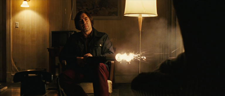 Anton Chigurh firing the bolt gun in No Country for Old Men
